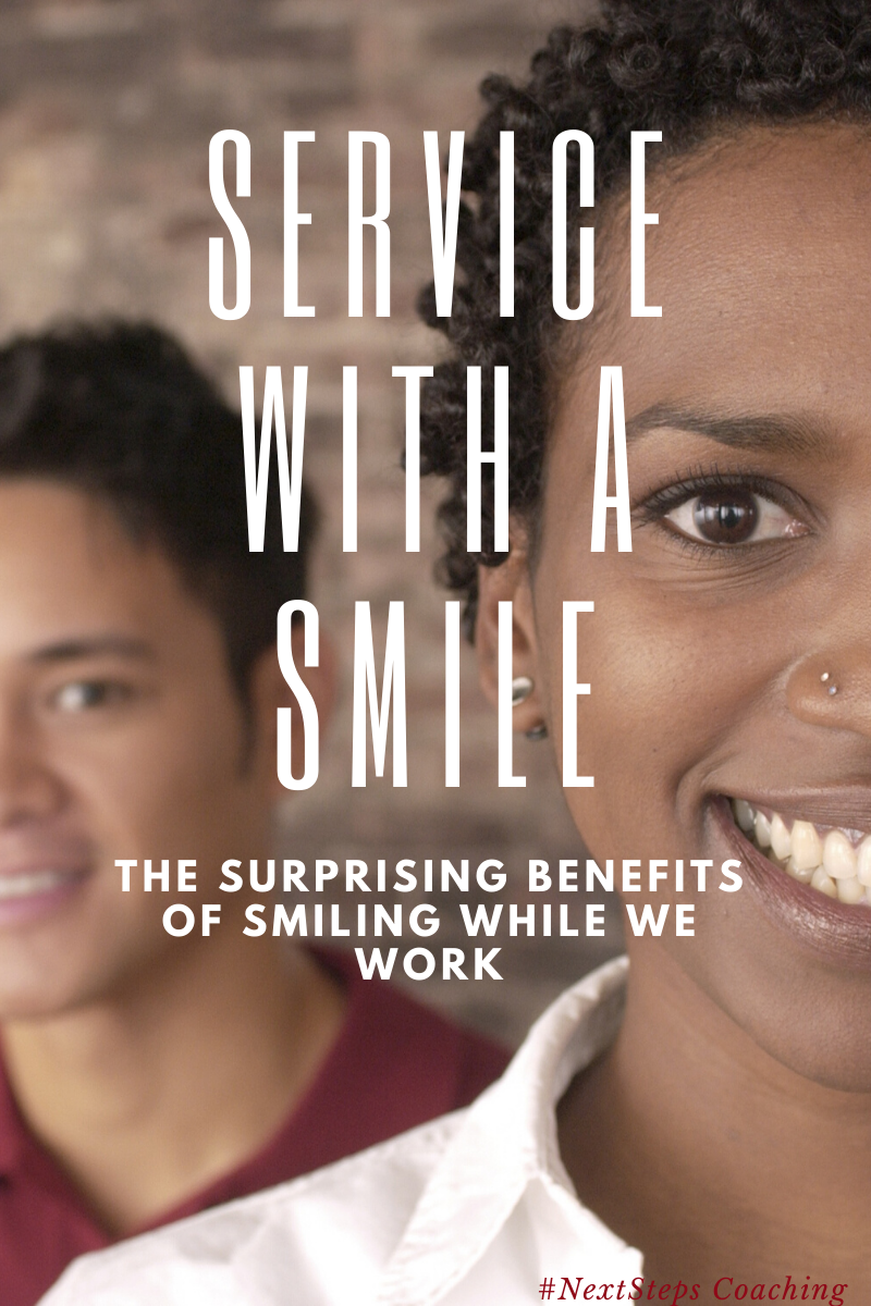 Smiling employees with overlay text, "Service with a smile"